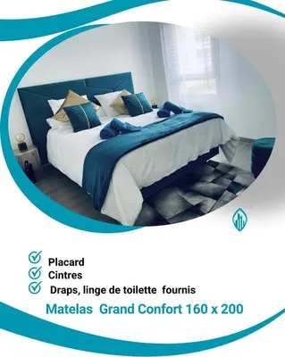 Un ou plusieurs lits dans un hébergement de l'établissement Appartement T2 Cosy