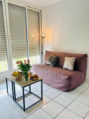 Coin salon dans l'établissement T3 lumineux, parking privé, calme, jolie vue