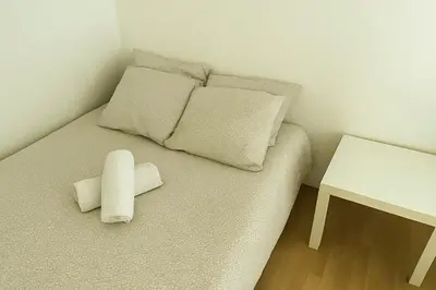 Un ou plusieurs lits dans un hébergement de l'établissement Quiet studio for 4 people area Jacobins-Bellecour