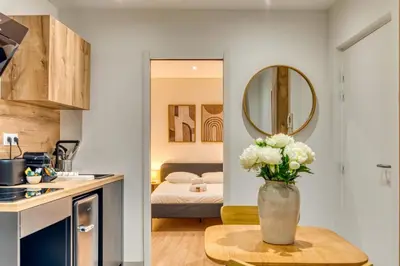 Cuisine ou kitchenette dans l'établissement Le Bois Doré - Cosy - Sainte-Foy-Les-Lyon