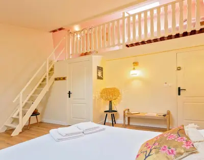 Un ou plusieurs lits dans un hébergement de l'établissement La Maison Mori