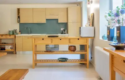 Cuisine ou kitchenette dans l'établissement La Maison Mori