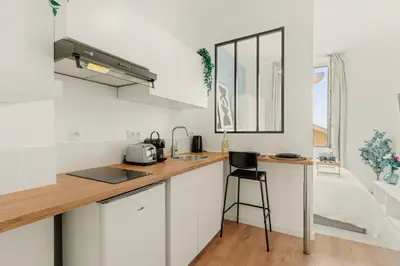 Cuisine ou kitchenette dans l'établissement Petit Paradis proche transports