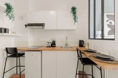 Cuisine ou kitchenette dans l'établissement Petit Paradis proche transports