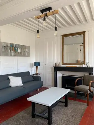 Coin salon dans l'établissement Le Gîte d'Antoine - Beaujolais