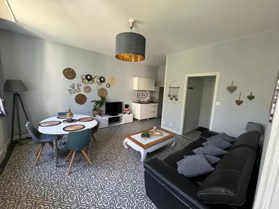 Coin salon dans l'établissement Appartement dans le Beaujolais