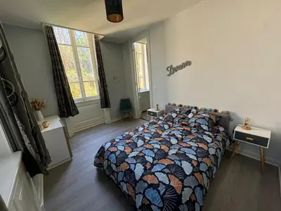 Un ou plusieurs lits dans un hébergement de l'établissement Appartement dans le Beaujolais
