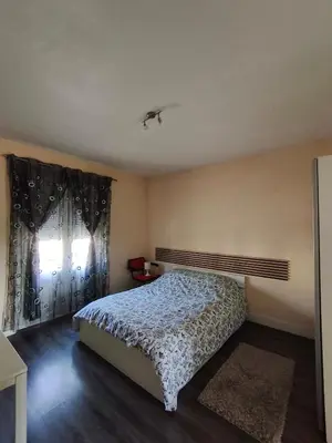 Un ou plusieurs lits dans un hébergement de l'établissement 101 Appartement