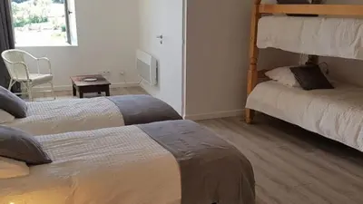 Un ou plusieurs lits dans un hébergement de l'établissement Maison de village - Font Bénite