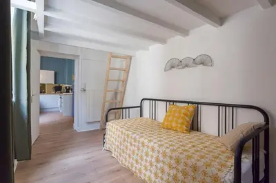Un ou plusieurs lits dans un hébergement de l'établissement Apartment in the heart of Presqu’île Lyon