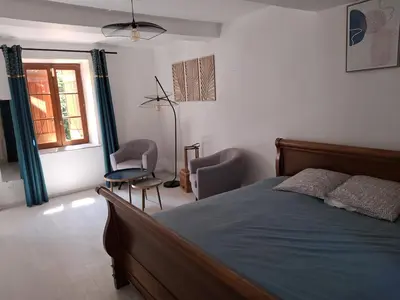 Un ou plusieurs lits dans un hébergement de l'établissement Appartement à la campagne