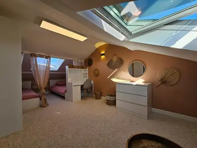 Un ou plusieurs lits dans un hébergement de l'établissement 4 chambres - 200m2 - Parking - Jardin