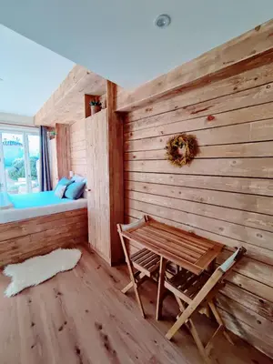 Coin salon dans l'établissement Le Petit Oingt de Paradis Chambre d'hôtes