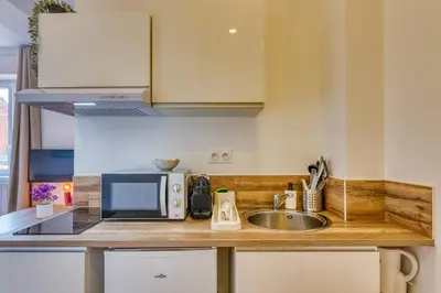 Cuisine ou kitchenette dans l'établissement La Suite DolceVita - Lyon 5 - lumineux et rénové