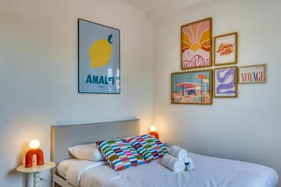 Un ou plusieurs lits dans un hébergement de l'établissement La Suite DolceVita - Lyon 5 - lumineux et rénové