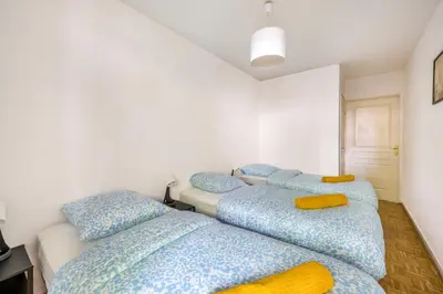 Un ou plusieurs lits dans un hébergement de l'établissement BnGo I Immense Terrasses I 3 chambres, garage, 9 pers