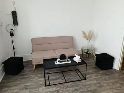 Coin salon dans l'établissement Oasis au cœur de la ville