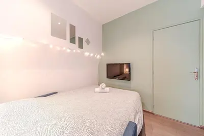 Un ou plusieurs lits dans un hébergement de l'établissement Cozy T2 near Part-Dieu 4 people Lafayette District
