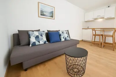 Coin salon dans l'établissement Functional and well located studio close to metro and shops