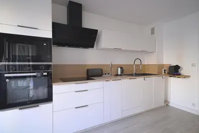 Cuisine ou kitchenette dans l'établissement Appartement de caractère Central Cosy & Calme