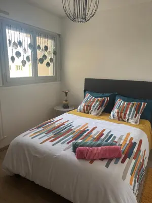 Un ou plusieurs lits dans un hébergement de l'établissement Chambre à louer