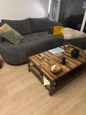 Coin salon dans l'établissement Chambre à louer
