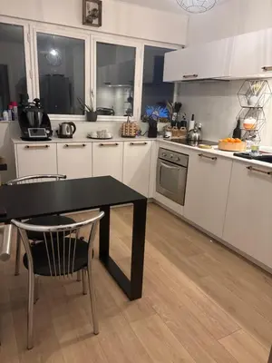 Cuisine ou kitchenette dans l'établissement Chambre à louer