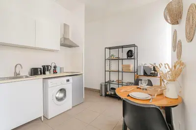 Cuisine ou kitchenette dans l'établissement Cosy et Calme proche Part-Dieu