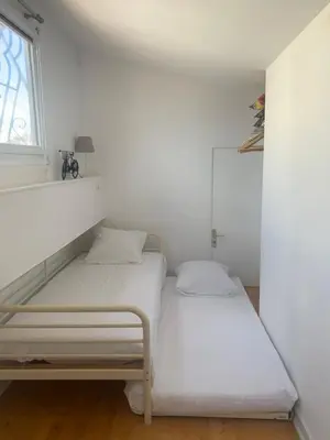 Un ou plusieurs lits dans un hébergement de l'établissement Appartement Vieux Lyon Terrasse