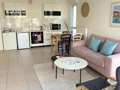 Cuisine ou kitchenette dans l'établissement Côté Parc - appart cosy, terrasse, parking & au pied du métro à Lyon