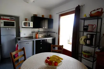 Cuisine ou kitchenette dans l'établissement Maison d'Hôtes des 2 Chênes