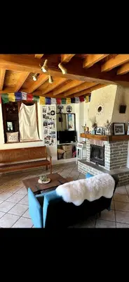 Coin salon dans l'établissement La Maison du Bonheur