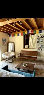 Coin salon dans l'établissement La Maison du Bonheur