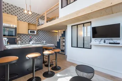 Cuisine ou kitchenette dans l'établissement Belfort- Duplex