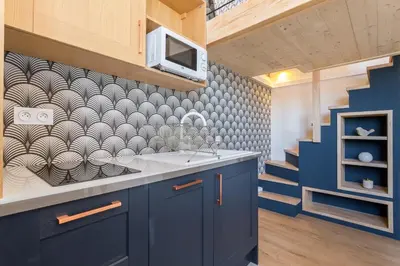 Cuisine ou kitchenette dans l'établissement Belfort- Duplex