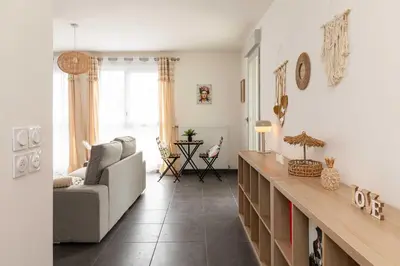 Coin salon dans l'établissement Charming Apartment 2BR 4P - Near to Lyon