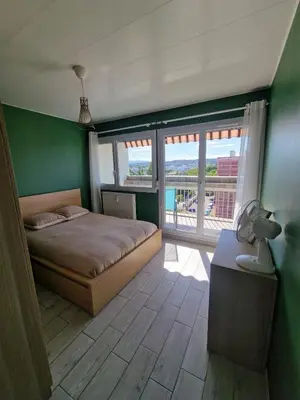 Un ou plusieurs lits dans un hébergement de l'établissement Appartement Moderne 8 etage
