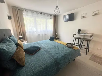 Un ou plusieurs lits dans un hébergement de l'établissement Studio Le Cocon 22m2