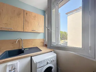 Cuisine ou kitchenette dans l'établissement Le Cosy Genin - 3 Chambres Bureaux Parking