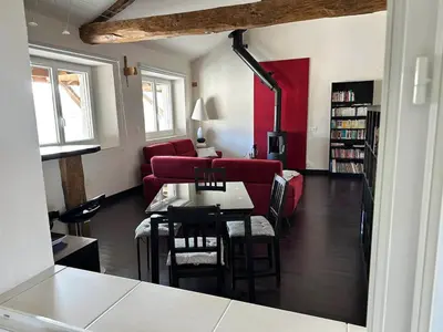 Coin salon dans l'établissement Grange du Lac Clair