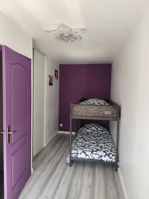 Un ou plusieurs lits dans un hébergement de l'établissement Cozy accommodation near Lyon