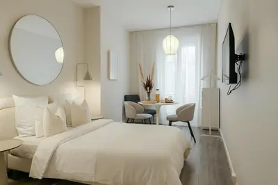 Télévision ou salle de divertissement dans l'établissement Suite Onneg