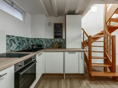 Cuisine ou kitchenette dans l'établissement Cocon Tête d'or