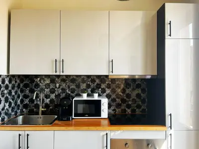 Cuisine ou kitchenette dans l'établissement Suite Nayrobi - Appartement 2 personnes - Check in h24 & wifi