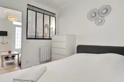 Un ou plusieurs lits dans un hébergement de l'établissement Appartement T2 - Quartier Charpennes à Villeurbanne