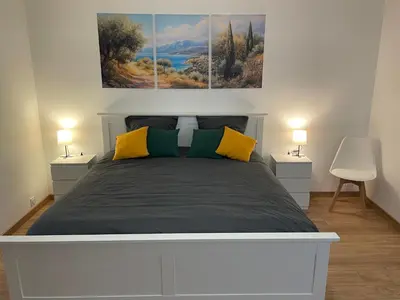 Un ou plusieurs lits dans un hébergement de l'établissement Large 85 m2 duplex apartment