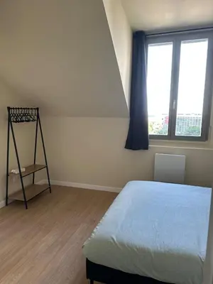 Un ou plusieurs lits dans un hébergement de l'établissement Appartement gare chateaucreux