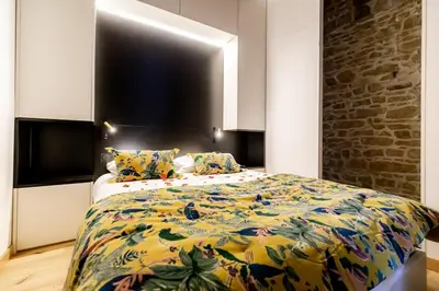 Un ou plusieurs lits dans un hébergement de l'établissement SWEET LEONE II -appartement avec spa privé-Lyon Place Terreaux