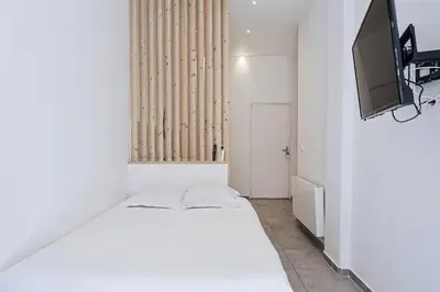 Télévision ou salle de divertissement dans l'établissement LES BULLES DE MONA - Luna - Spa - Clim