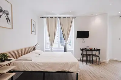 Un ou plusieurs lits dans un hébergement de l'établissement LES BULLES DE MONA - Chic - Spa - Clim